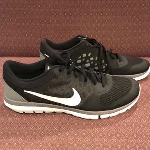 Nike 2015 FLEX RUN running shoes.  Black with grey and white trim. Size 11.5